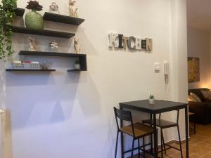 a dining room with a table and two chairs at Casa Sofia Lissone in Lissone