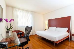 Postel nebo postele na pokoji v ubytování Hilton Garden Inn Florence Novoli