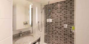 Ванная комната в Hampton by Hilton Frankfurt City Centre