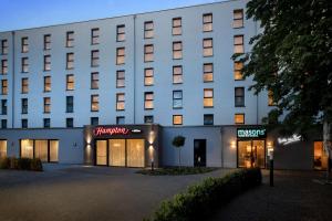 una representación de la parte delantera de un hotel en Hampton By Hilton Kaiserslautern, en Kaiserslautern