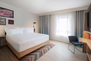 Hampton By Hilton Kaiserslautern客房内的一张或多张床位