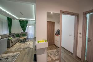 a living room with a couch and a table at Apartment Lara in Ulcinj