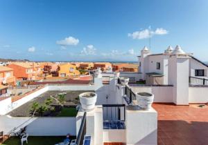 Imagen de la galería de ideal remote work, relaxing, pool and surfing, en Corralejo