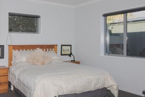 Ένα ή περισσότερα κρεβάτια σε δωμάτιο στο Colcord Hideaway