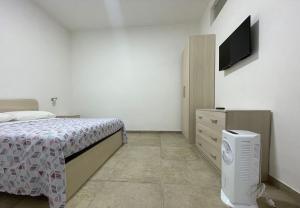 Postel nebo postele na pokoji v ubytování Case Perrone