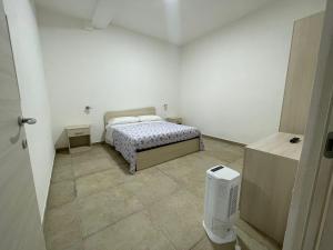 Postel nebo postele na pokoji v ubytování Case Perrone