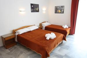 Кровать или кровати в номере Archontiko Driani