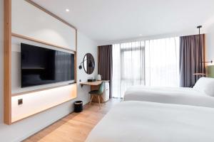Hilton Garden Inn Faroe Islands 객실 침대