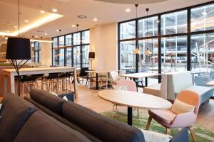 Posezení v ubytování Hilton Garden Inn Munich Messe + 59 fotografií