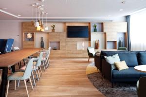 Лаундж или бар в Hilton Garden Inn Munich Messe