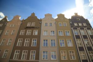 a large building in the center of a city at Hampton By Hilton Gdansk Old Town in Gdańsk