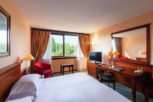 Postel nebo postele na pokoji v ubytování Hilton Strasbourg