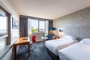 Postel nebo postele na pokoji v ubytování Hilton Strasbourg