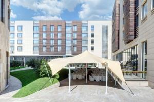 a tent set up in the courtyard of a building at DoubleTree by Hilton Moscow – Marina in Moscow