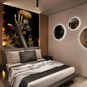 Postel nebo postele na pokoji v ubytování La Pergola Suites