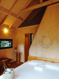Postel nebo postele na pokoji v ubytování Casa sull'Albero Awen - Casa Vacanze