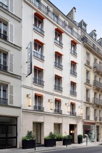 une image de l'avant d'un bâtiment dans l'établissement Le Belgrand Hotel Paris Champs Elysees, Tapestry By Hilton, à Paris