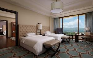 Hilton Dushanbe客房内的一张或多张床位