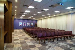 a conference room with a row of chairs in it at Hampton by Hilton Brest in Brest