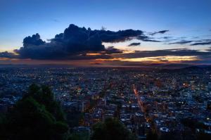 a view of a city at dusk at Hilton Bogotá in Bogotá