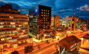 a view of a city at night with buildings at Hilton Bogotá in Bogotá