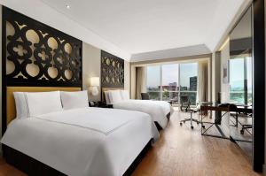 Rúm í herbergi á Hilton Lima Miraflores