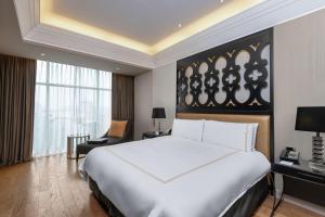 Rúm í herbergi á Hilton Lima Miraflores