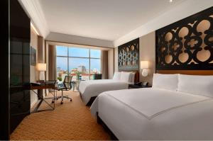 Rúm í herbergi á Hilton Lima Miraflores
