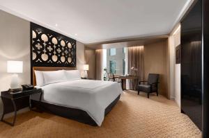 Rúm í herbergi á Hilton Lima Miraflores