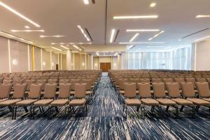 an empty room with rows of chairs in it at Hilton Garden Inn Mexico City Santa Fe in Mexico City