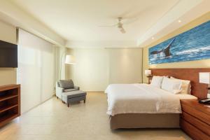Postel nebo postele na pokoji v ubytování Hampton Inn & Suites by Hilton Los Cabos