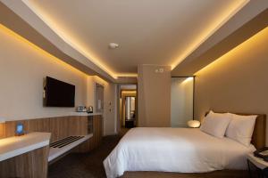 Cama ou camas em um quarto em Hilton Garden Inn Lima Miraflores