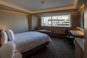 Cama ou camas em um quarto em Hilton Garden Inn Lima Miraflores