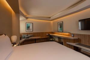 Cama ou camas em um quarto em Hilton Garden Inn Lima Miraflores