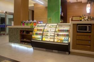 a store with a display of food and drinks at Hampton Inn by Hilton Villahermosa in Villahermosa