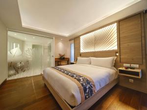 Кровать или кровати в номере Hilton Hotel Tahiti