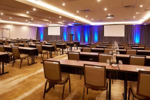 a conference room with tables and chairs in it at Hilton Denver City Center in Denver