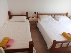 Säng eller sängar i ett rum på Apartments with a parking space Mastrinka, Ciovo - 9428