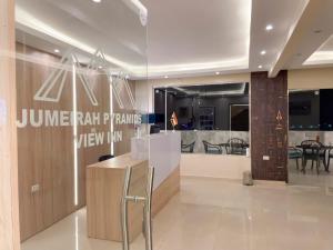 Restoran või mõni muu söögikoht majutusasutuses Jumeirah pyramids view inn