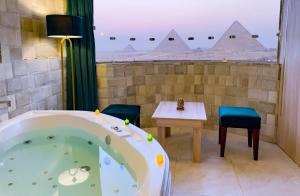 Foto Kairos asuva majutusasutuse Jumeirah pyramids view inn galeriist