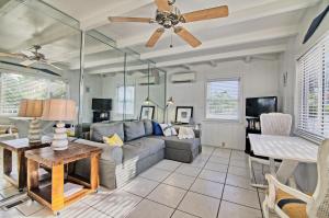 a living room with a couch and a ceiling fan at Gulfside Resort Unit 9 in St. Pete Beach