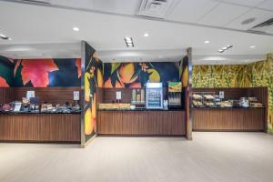a fast food restaurant with two counters with food at Fairfield Inn & Suites by Marriott Bloomsburg in Bloomsburg