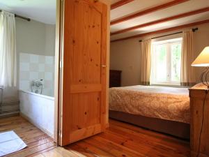 Postel nebo postele na pokoji v ubytování Group Villa with Sauna