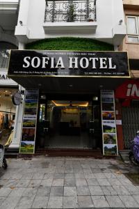 a sign for a solla hotel on a building at Hanoi Sofia Hotel in Hanoi