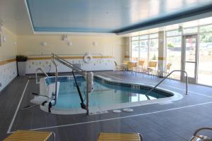 a swimming pool in a building with a swimming pool at Fairfield by Marriott The Dalles in The Dalles
