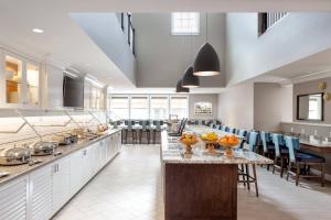 a large kitchen with a large island with fruits on it at Residence Inn Los Angeles Torrance/Redondo Beach in Torrance