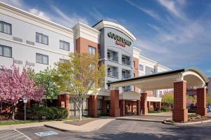a rendering of a hotel with a hotel entrance at Courtyard by Marriott Pittsburgh West Homestead Waterfront in West Homestead