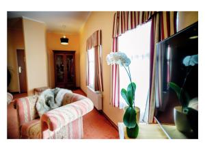 Postel nebo postele na pokoji v ubytování Hotel Fenix