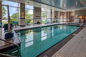 a large swimming pool in a hotel room at Residence Inn Norfolk Downtown in Norfolk