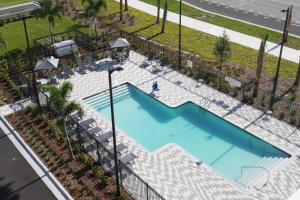 an overhead view of a swimming pool at a resort at Fairfield Inn & Suites by Marriott Melbourne Viera Town Center in Melbourne